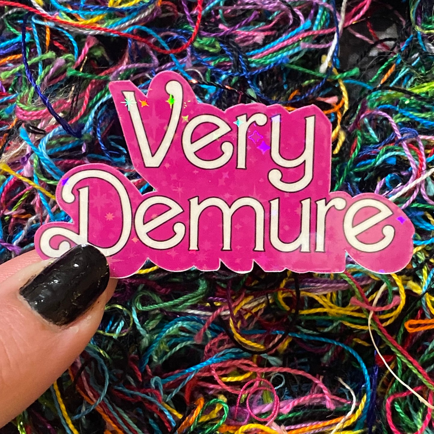 Demure Sticker