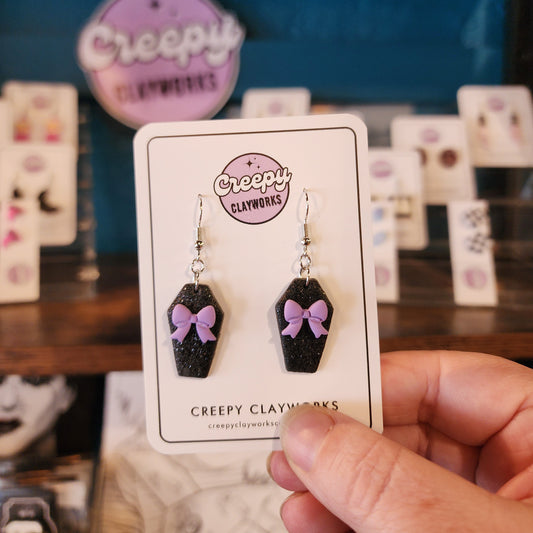 Black Sparkly Coffins with Purple Bows - Drop Earrings